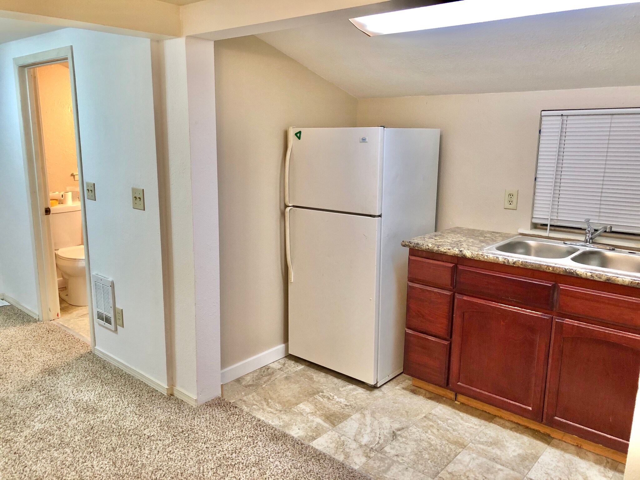 New flooring on main floor, new paint, new countertop, new sink, easy living here! - 1007 W Main St