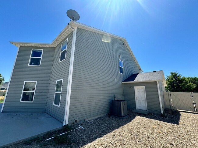 Building Photo - Coming Soon: Spacious 5-Bedroom Home with 3-Car Garage in Nampa