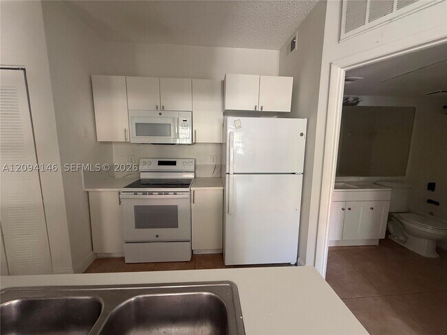 Building Photo - 18310 NW 68th Ave