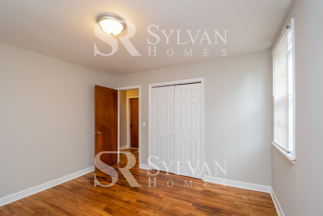 Building Photo - Welcome to this charming abode.