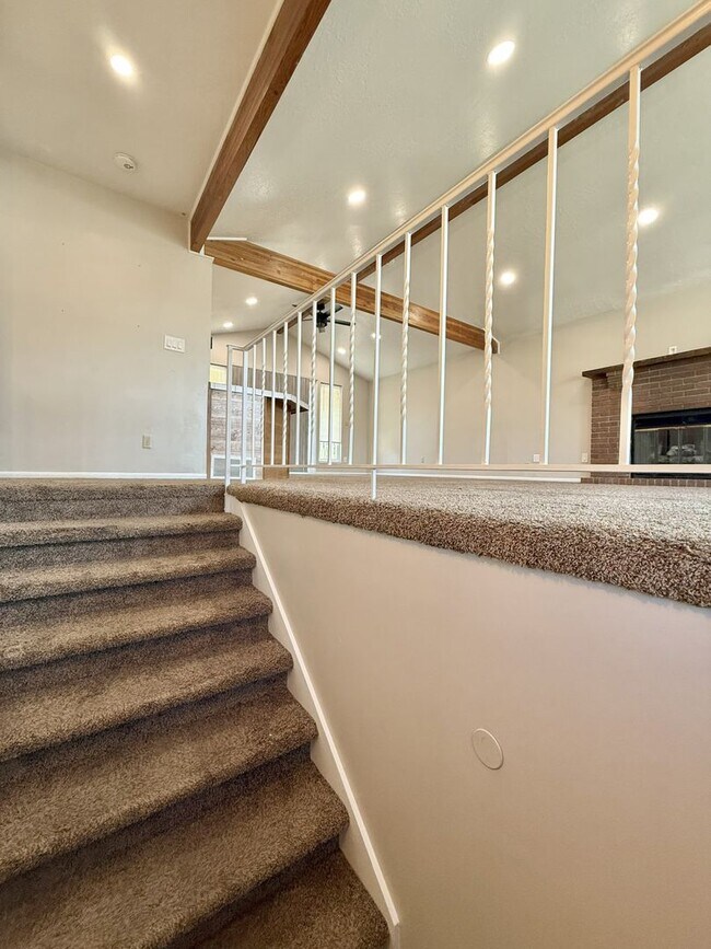 Building Photo - Spacious Comfort Meets Practical Living in...