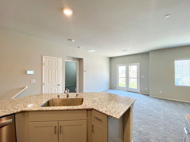 Building Photo - UPGRADED 2 BEDROOM TOWNHOME IN GATED COMMU...