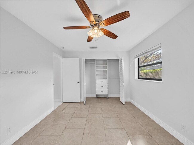 Building Photo - 10251 NW 39th Ct