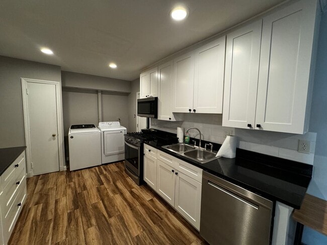 Building Photo - Spacious Furnished 4BR Home with Prime Location Near Marymount and Metro