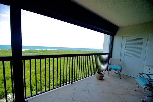 Building Photo - 6075 Pelican Bay Blvd