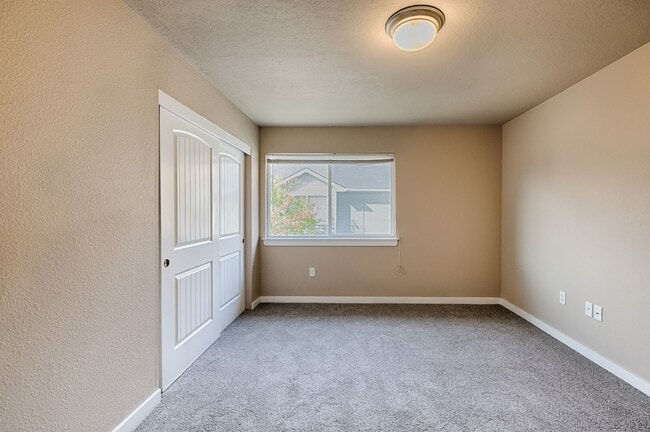 Building Photo - Beautiful condo in a great Boise location with a community pool and playground
