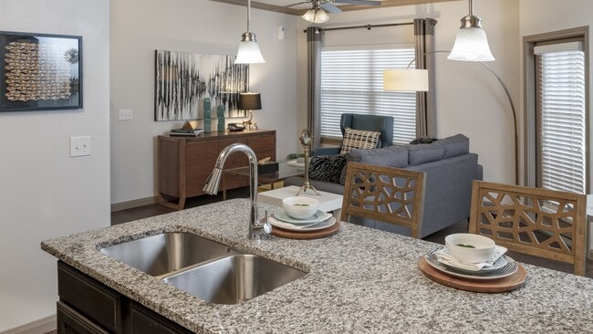 Open-concept living - West Creek Apartments