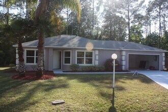 Building Photo - Unique 2/2/2 with Florida room with a/c