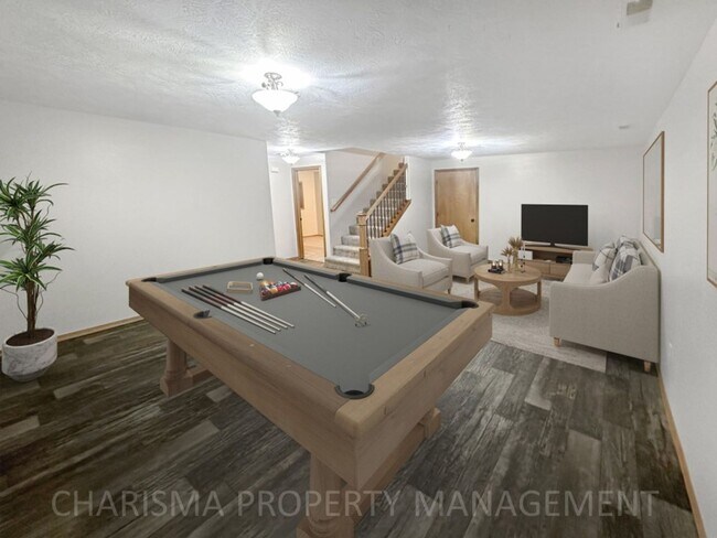Building Photo - 4 BEDROOM, 2 BATH TOWN HOME, PET FRIENDLY, AMENITY FILLED, DOUBLE ATTACHED GARAGE!