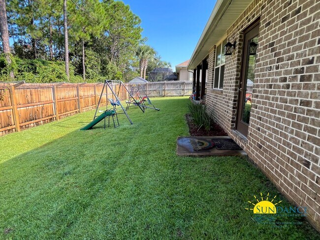 Building Photo - Efficient Solar 4-Bedroom Home in Navarre’s La Fontaine Gated Community with Deeded Beach Access!