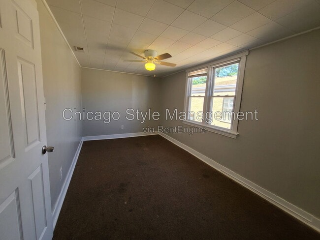 Building Photo - 6035 S Karlov Ave