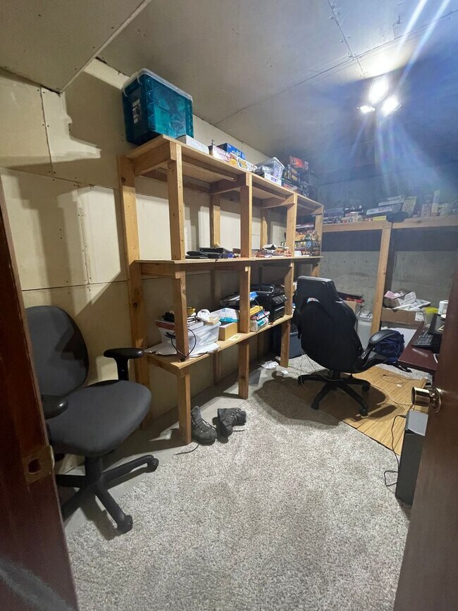 Building Photo - Spacious, four-bedroom, two-bathroom, coun...