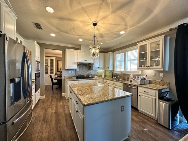 Building Photo - Spacious 4 Bed, 3 Bath Home with Bonus Room & Golf Course Views in Wild Wings