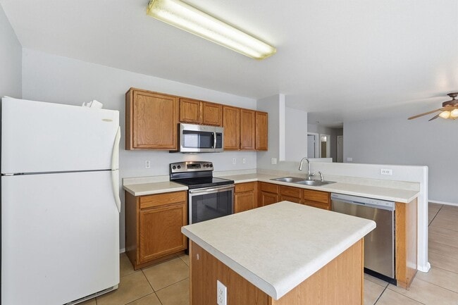 Building Photo - Johnson Ranch 3 Bedroom! Tile Throughout All Appliances!