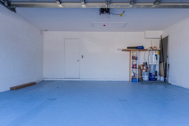 Building Photo - Spacious 4-Bed Groveland Home with Attached Garage, Central Air, and Private Patio