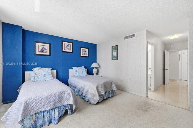 Building Photo - 9801 Collins Ave