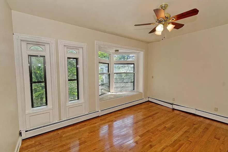 window seat in primary bedroom - 342 Hudson Ave