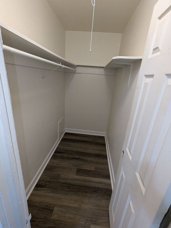 Building Photo - Ground Level 2 Bedroom, 2 Bath apartment. New flooring and paint. Tenant pays electric and natura...