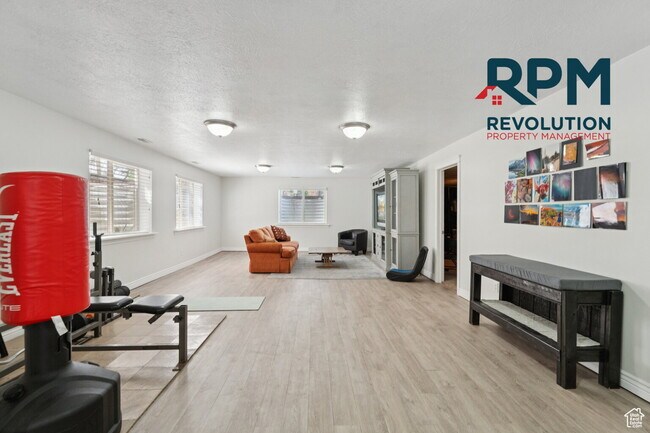 Building Photo - "Spacious 6-Bed Gem with Granite Touches & Cozy Fireplace in Morgan!"