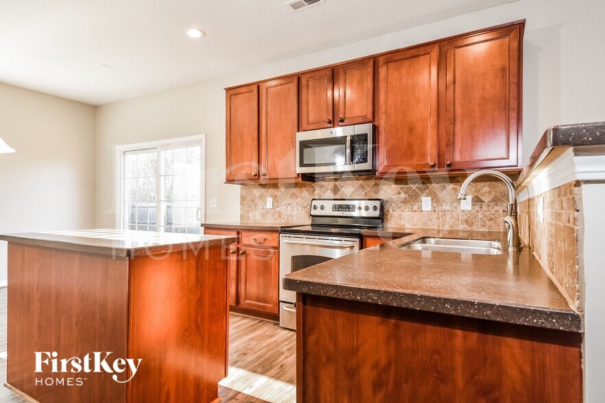 Building Photo - 6465 Flintlock Ct