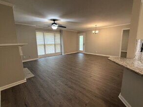 Building Photo - "Cozy 2-Bed Condo in Huntsville with Firep...