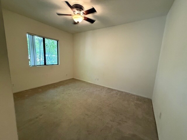 2nd rear bedroom with ceiling fan/light - 10481 Riverside Dr