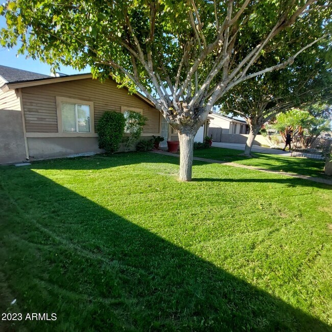 Building Photo - 1636 N 64th Dr