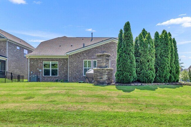 Building Photo - Beautifully maintained and move-in ready, this stunning mostly one-level all-brick home