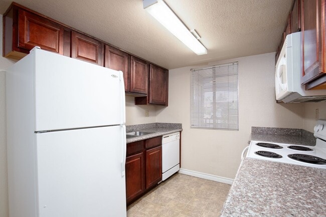 Building Photo - First floor unit in guard gated SW communi...