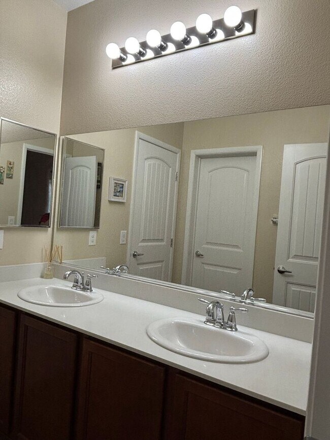 Building Photo - Gated 3-Bedroom Home with Community Pool Near Fort Apache & Blue Diamond