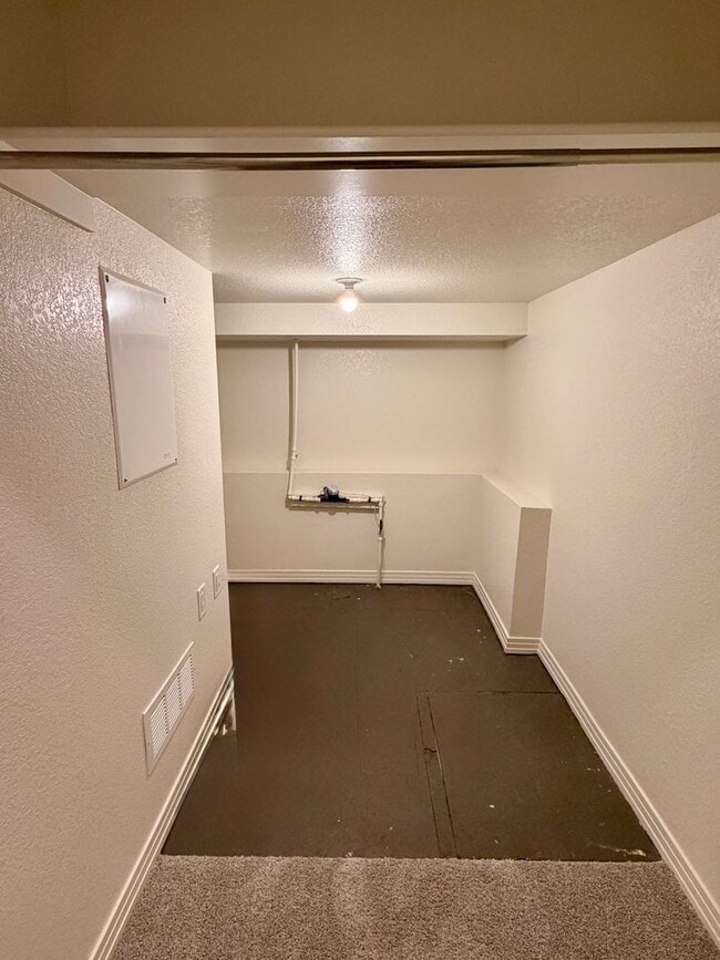 Building Photo - Move-In Ready 3-Story Townhome with Loft & 2-Car Garage