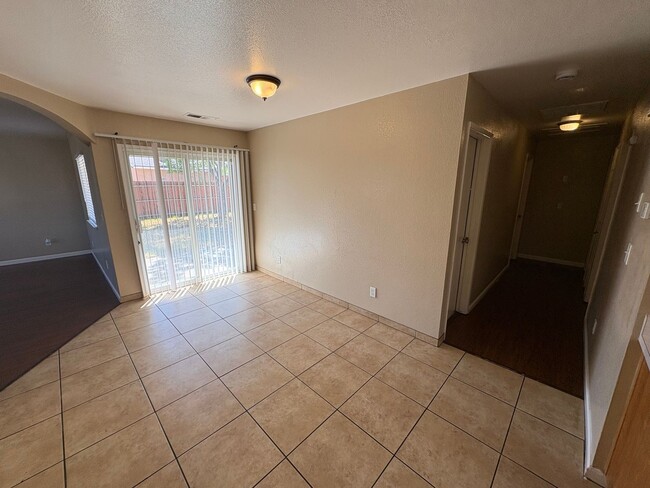 Building Photo - Charming Tulare home available now!