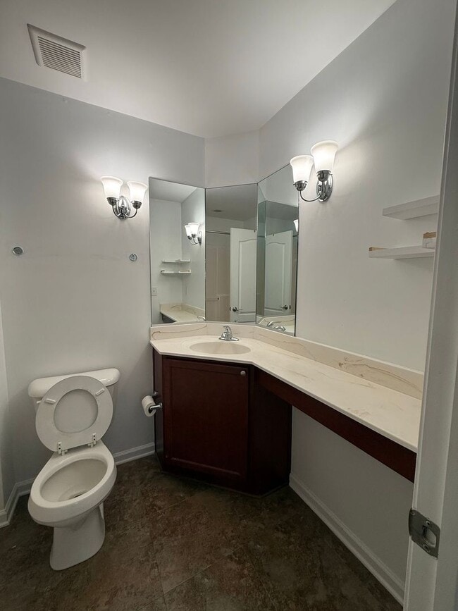 Building Photo - Spacious End-Unit Condo with Dual Primary Suites & Bonus Room