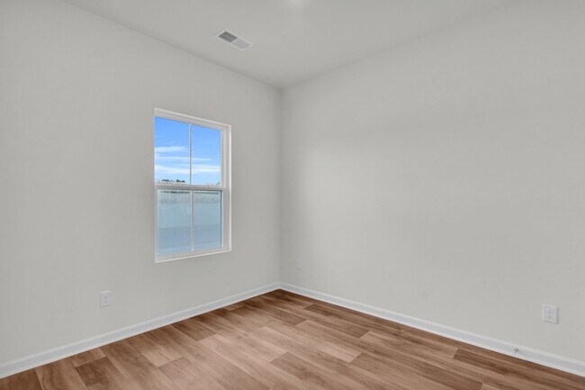 Building Photo - BRAND NEW TOWNHOME!