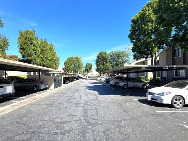 Building Photo - Ground Level 2 Bedroom Condo with Private Patio in Gated Community for Lease