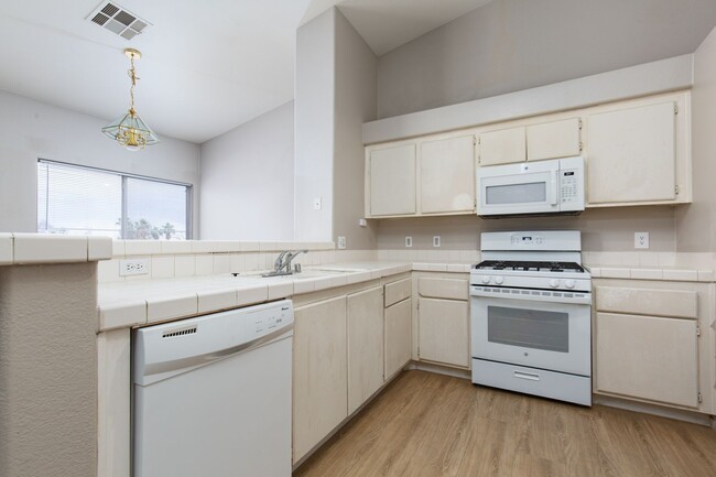 Building Photo - Two bedroom with two car garage in gated c...