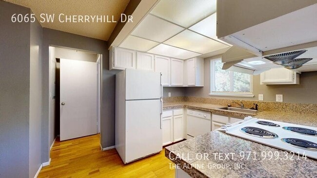 Building Photo - 6065 SW Cherryhill Dr