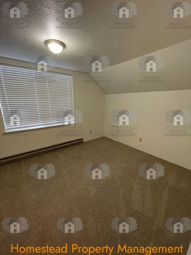 Building Photo - Celebrate the new year with 1/2 off one months rent!