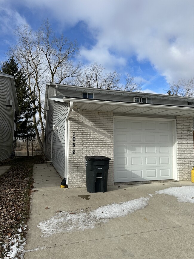 1.5 car garage with 8’ tall door - 1052 Lakeshore Dr