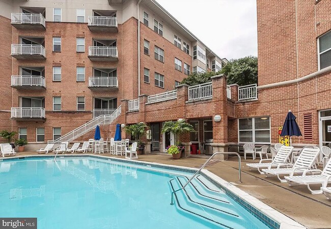 courtyard stairs down lead to pool - 23 Pierside Dr
