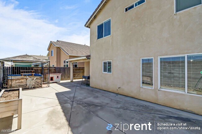 Building Photo - 5 br, 3 bath House - 1003 Sun Meadow Drive...