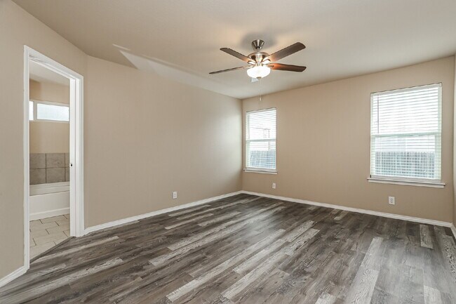 Building Photo - "Charming 4-Bed Sanctuary on Live Oak Pass with Modern Granite Finishes!"