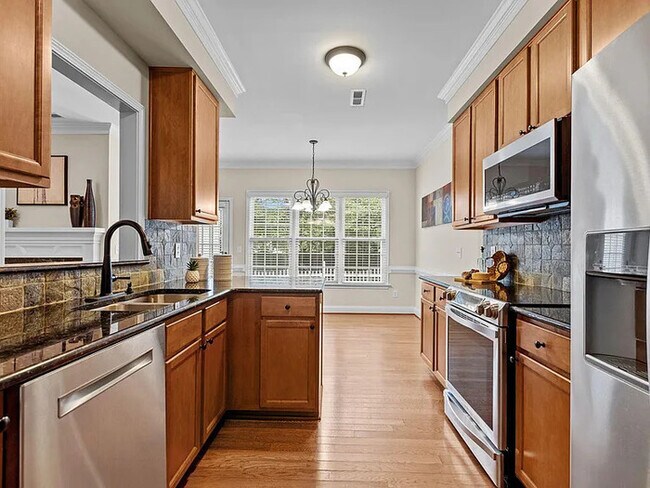 Building Photo - Earn Wealth While Leasing - Like a Homeown...