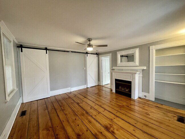 Building Photo - Seeking a roommate for a 2 bdr, 2 bath lower level condo with a porch and private yard, 1.5 miles...