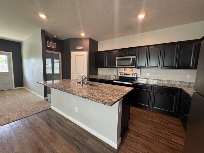 Building Photo - Spacious 4 Bedroom 3 Full Bath home in the Liberte Community!