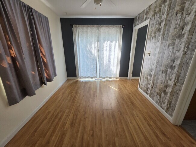 Building Photo - 2 Bedroom, 1 Bathroom West Hill Home with Fenced Yard, Garage, & Bonus Living Space