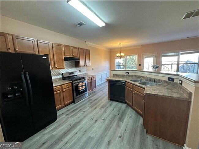 Building Photo - 6125 Crested Moss Dr