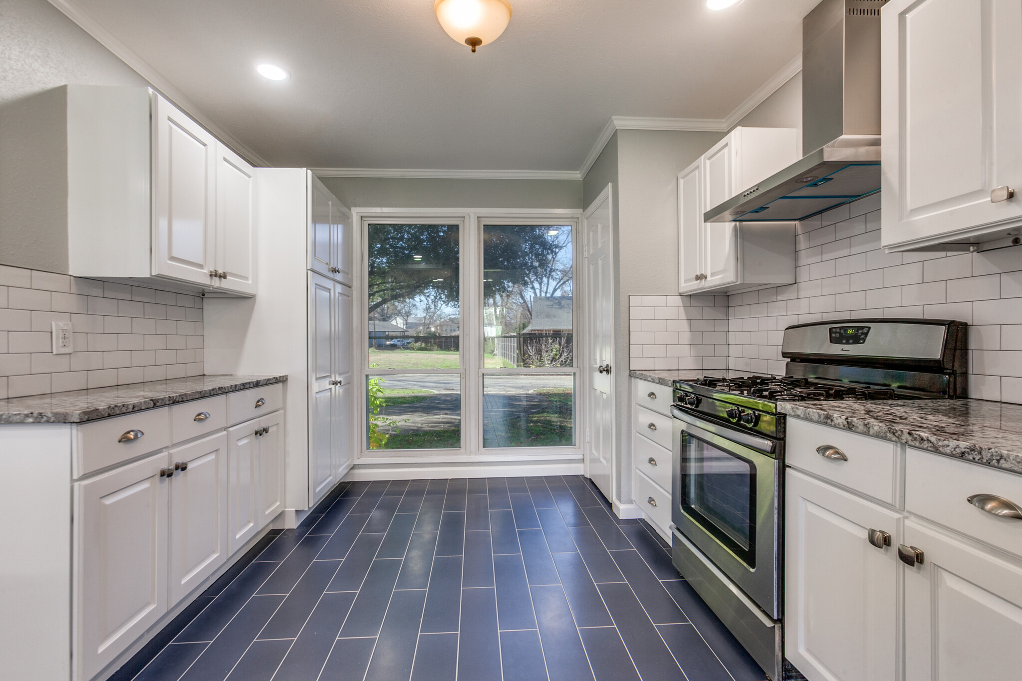 View from kitchen to the front street (facing west) - 8738 Glencrest Ln