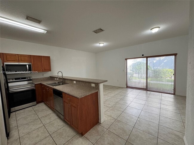 Building Photo - 14046 SW 49th St