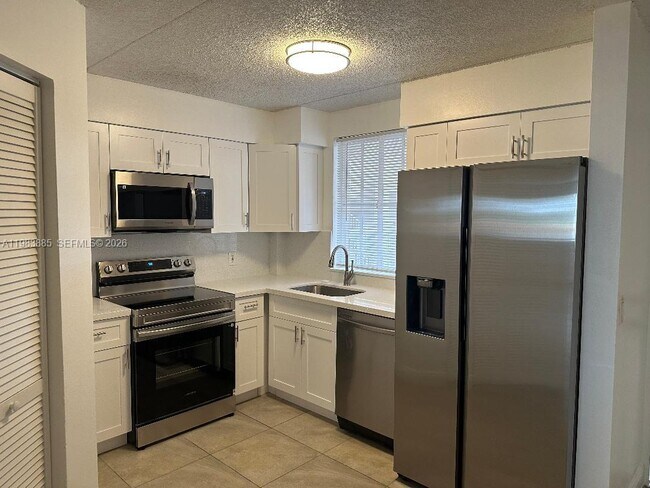 Building Photo - 6115 NW 186th St